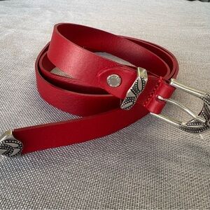 Red Leather Belt with Silver tone Buckle made in Italy size large measures 40”.